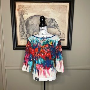 Bisou Bisou long sleeved low back top. Multi-colored and gently worn.